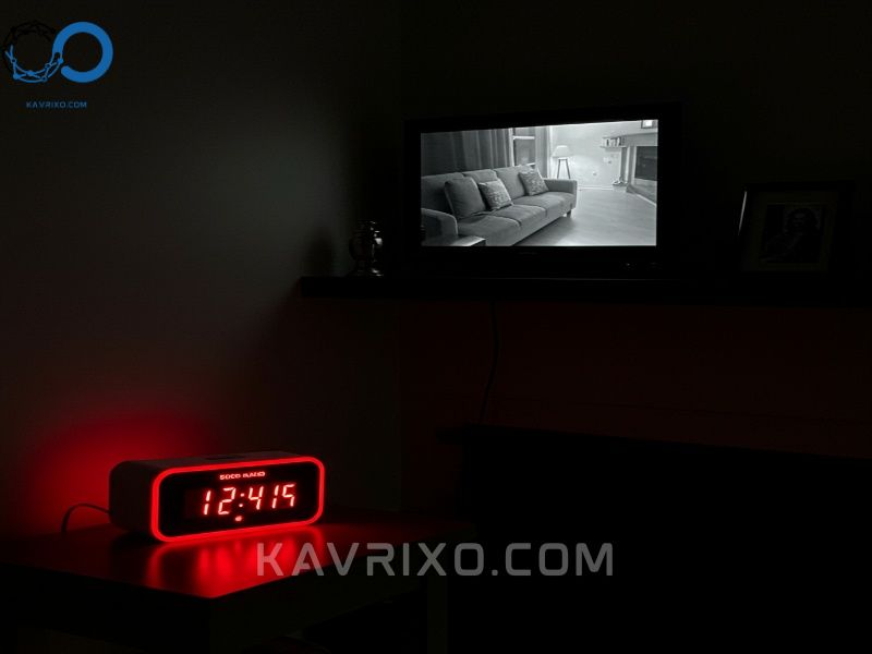clear-black-and-white-infrared-night-vision-of-a-dark-living-room-captured-by-a-hidden-camera-clock