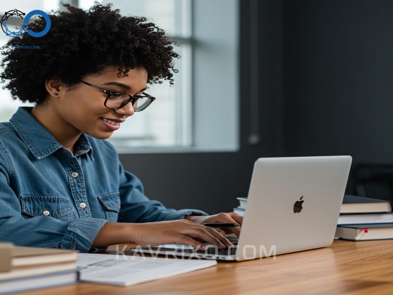 focused-student-working-on-a-chromebook-with-textbooks-and-notebooks