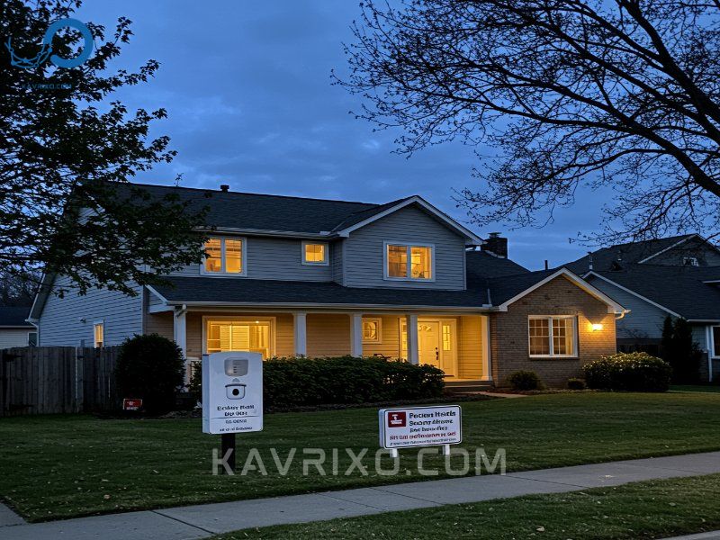secure-suburban-home-at-dusk-with-security-monitoring-sign